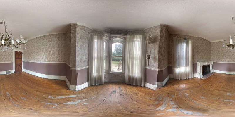 360° view of the parlour — chandelier, fireplace, bay window, floral wallpaper